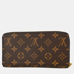 Louis Vuitton: Коричневый кошелёк  Zippy