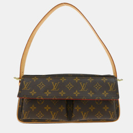 Louis Vuitton: Коричневая сумка 