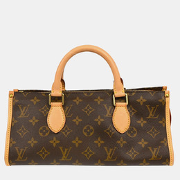 Louis Vuitton: Коричневая сумка 