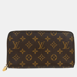 Louis Vuitton: Коричневый кошелёк  Zippy