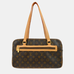 Louis Vuitton: Коричневая сумка 