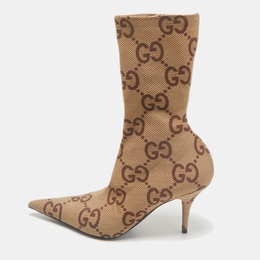 Gucci: Бежевые ботинки  GG