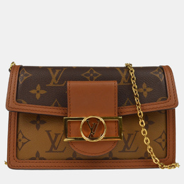Louis Vuitton: Коричневая сумка 
