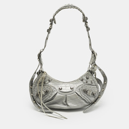 Balenciaga: Серебристая сумка  Le Cagole