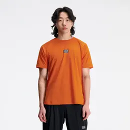 New Balance: Оранжевая футболка 