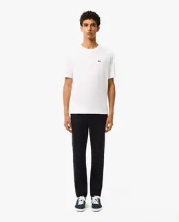 Lacoste: Обтягивающие брюки 