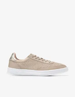 Cole Haan: Золотые кроссовки 