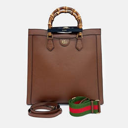 Gucci: Коричневая сумка-шоппер 