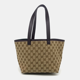 Gucci: Коричневая сумка 