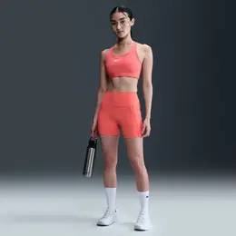 Nike: Оранжевые легинсы 