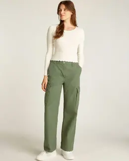 Tommy Jeans: Зелёные брюки 