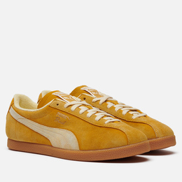 Puma: Жёлтые кроссовки 