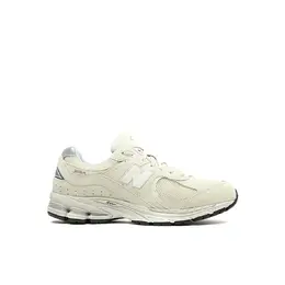 New Balance: Жёлтые кеды  2002R