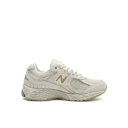 New Balance: Бежевые кеды  2002R