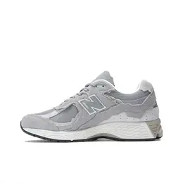 New Balance: Бежевые кроссовки  2002R