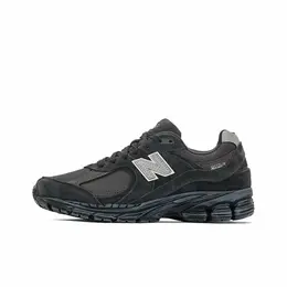 New Balance: Серые кроссовки 