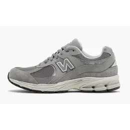 New Balance: Серые кроссовки 