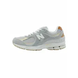 New Balance: Серые кроссовки 