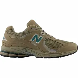 New Balance: Коричневые кроссовки 