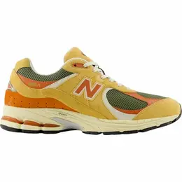 New Balance: Оранжевые кроссовки 
