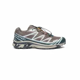 Salomon: Зелёные кроссовки 