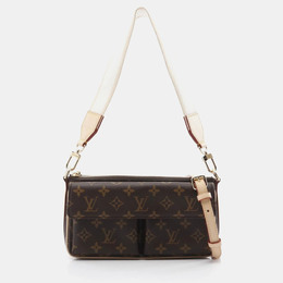 Louis Vuitton: Коричневая сумка 