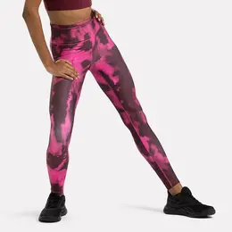 Reebok: Розовые легинсы 