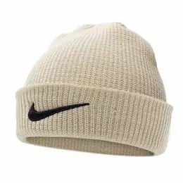 NIKE: Бежевая шапка 