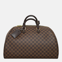 Louis Vuitton: Коричневая сумка 