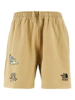 The North Face: Жёлтые шорты  Logo