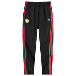 Adidas: Чёрные брюки 