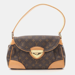 Louis Vuitton: Коричневая сумка 