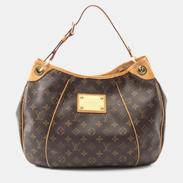 Louis Vuitton: Коричневая сумка 