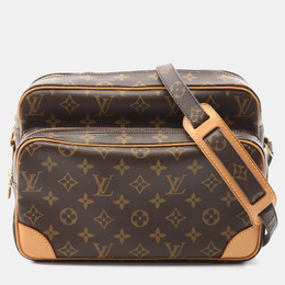 Louis Vuitton: Коричневая сумка 