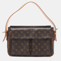 Louis Vuitton: Коричневая сумка 