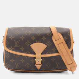 Louis Vuitton: Коричневая сумка 