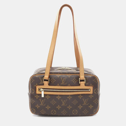 Louis Vuitton: Коричневая сумка 