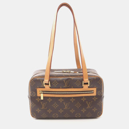 Louis Vuitton: Коричневая сумка 