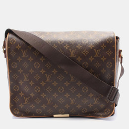 Louis Vuitton: Коричневая сумка 