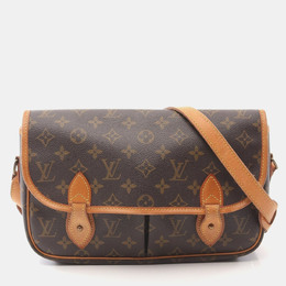 Louis Vuitton: Коричневая сумка 