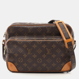 Louis Vuitton: Коричневая сумка 