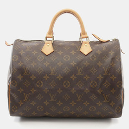 Louis Vuitton: Коричневая сумка  Speedy