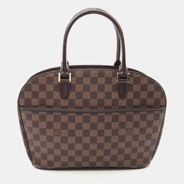 Louis Vuitton: Коричневая сумка 
