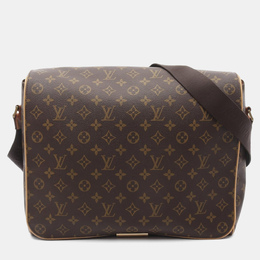 Louis Vuitton: Коричневая сумка 