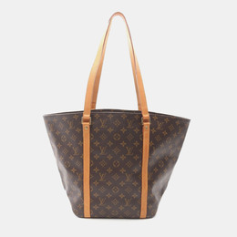 Louis Vuitton: Коричневая сумка-шоппер 