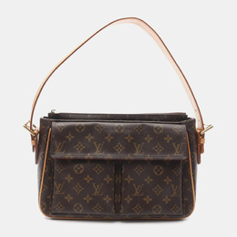 Louis Vuitton: Коричневая сумка 