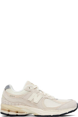 New Balance: Бежевые кроссовки  2002R
