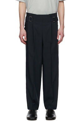 132 5. Issey Miyake: Тёмные брюки 