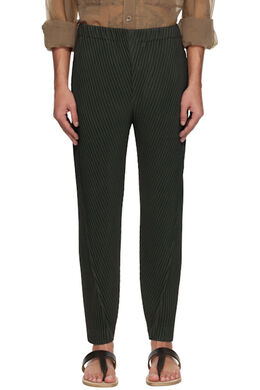 Homme Plissé Issey Miyake: Зелёные брюки 