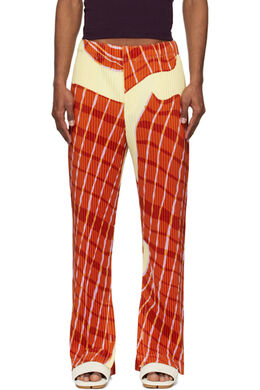 Homme Plissé Issey Miyake: Жёлтые брюки 